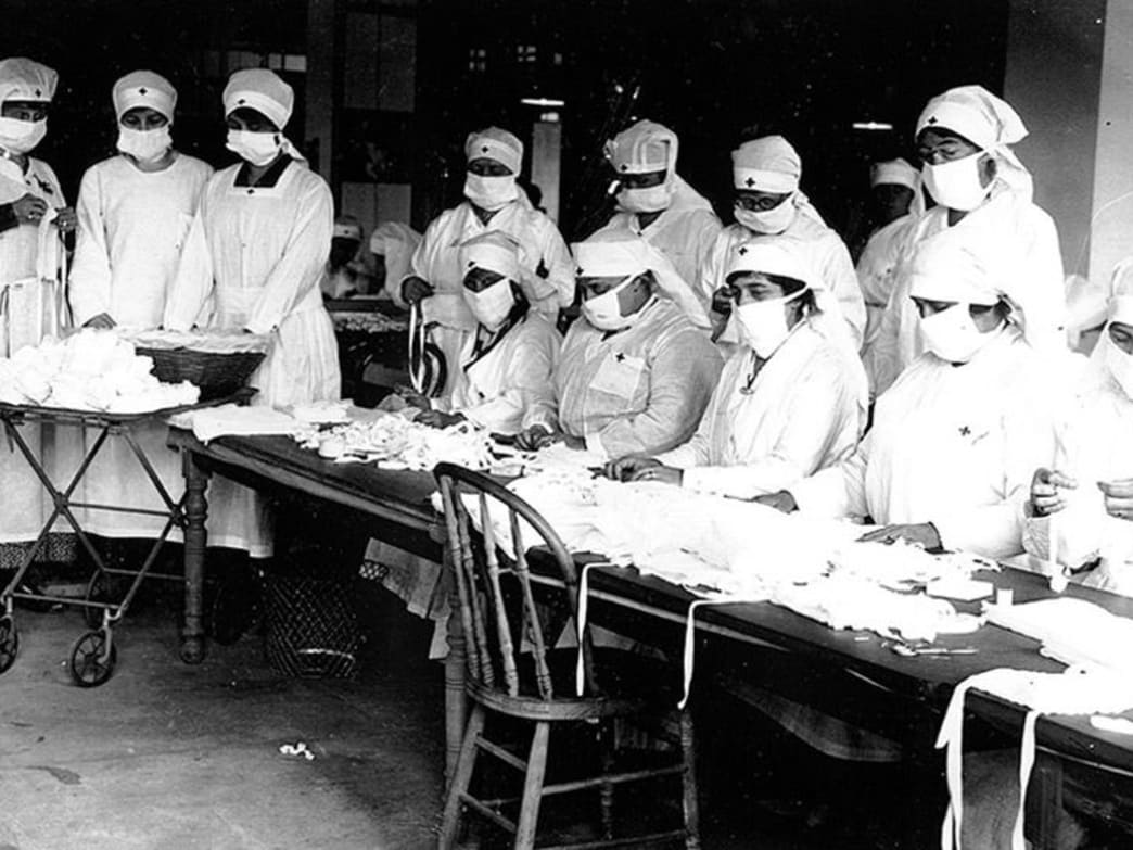What the 1918 flu pandemic can teach us about COVID-19, in four charts